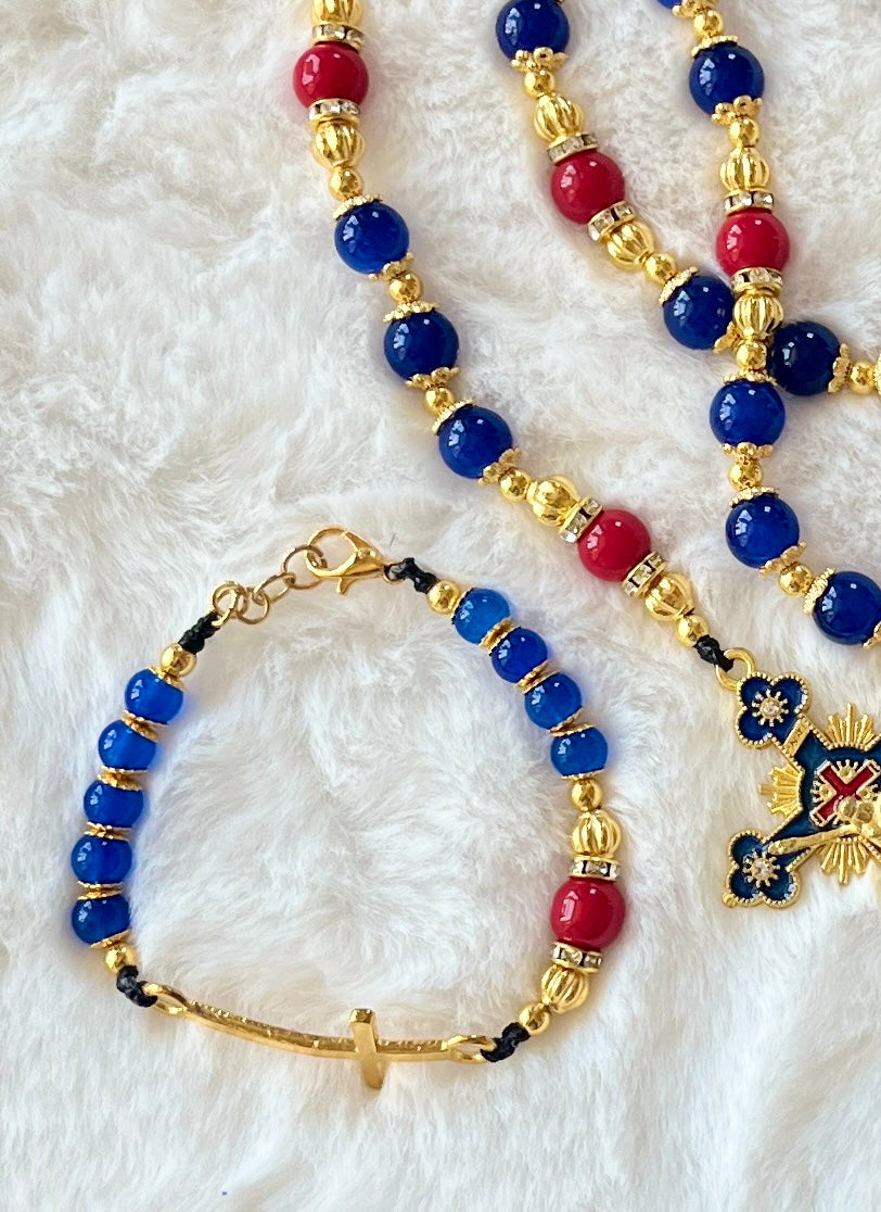  Handcrafted 3-piece Catholic gift set featuring a full 5-decade cobalt glass rosary, a matching gold heart clasp keychain, and a coordinated gold cross bracelet.