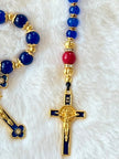  Handcrafted 3-piece Catholic gift set featuring a full 5-decade cobalt glass rosary, a matching gold heart clasp keychain, and a coordinated gold cross bracelet.