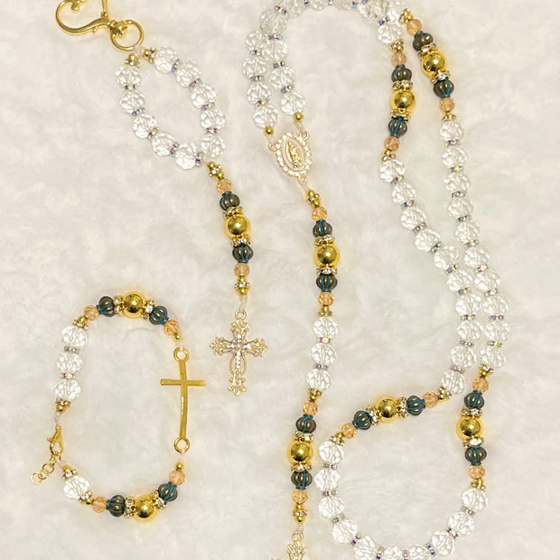 Handcrafted 3-piece Catholic gift set featuring a full 5-decade clear crystal rosary, a matching gold heart clasp keychain, and a coordinated gold cross bracelet.