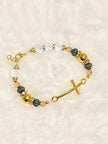 A beautiful wearable statement of faith chain-linked with a sleek curved gold cross bar, a secure lobster clasp closure, and an adjustable sizing extension chain.