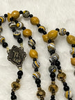 Handcrafted 5-decade yellow wooden lemon bead rosary with patterned accents, an Immaculate Heart of Mary center, and a St. Alphonsus crucifix.