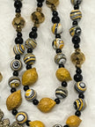 Handcrafted 5-decade yellow wooden lemon bead rosary with patterned accents, an Immaculate Heart of Mary center, and a St. Alphonsus crucifix.
